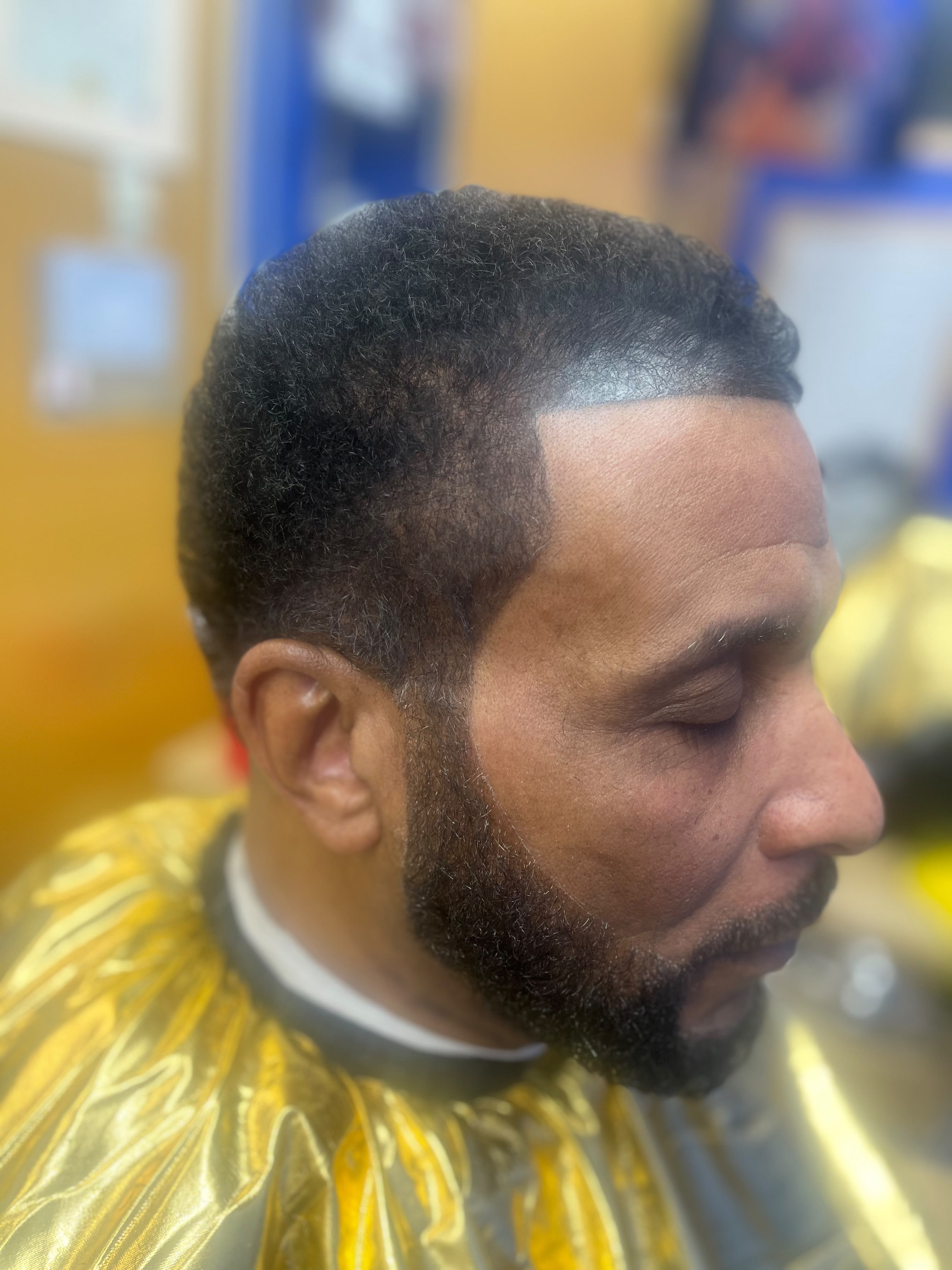 Barber cutting hair