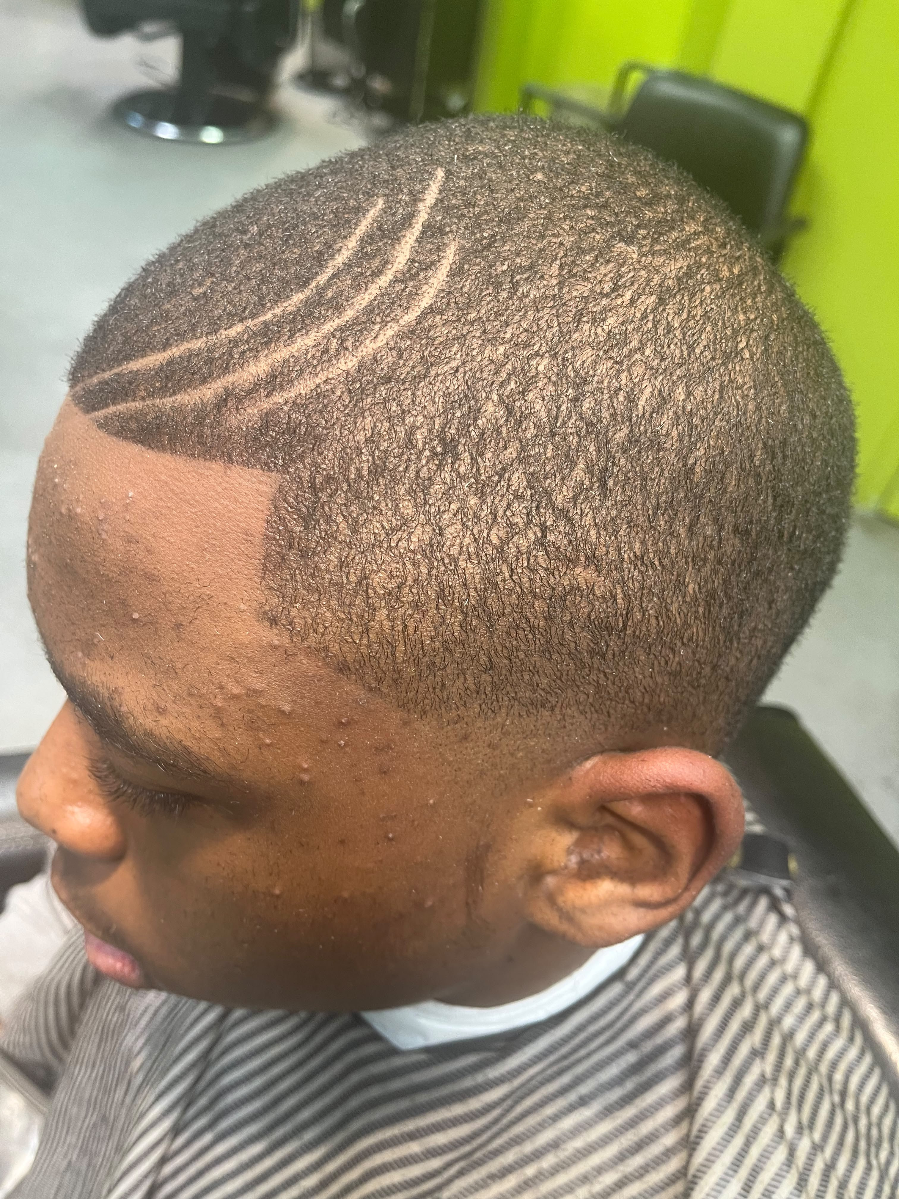 Barber cutting hair