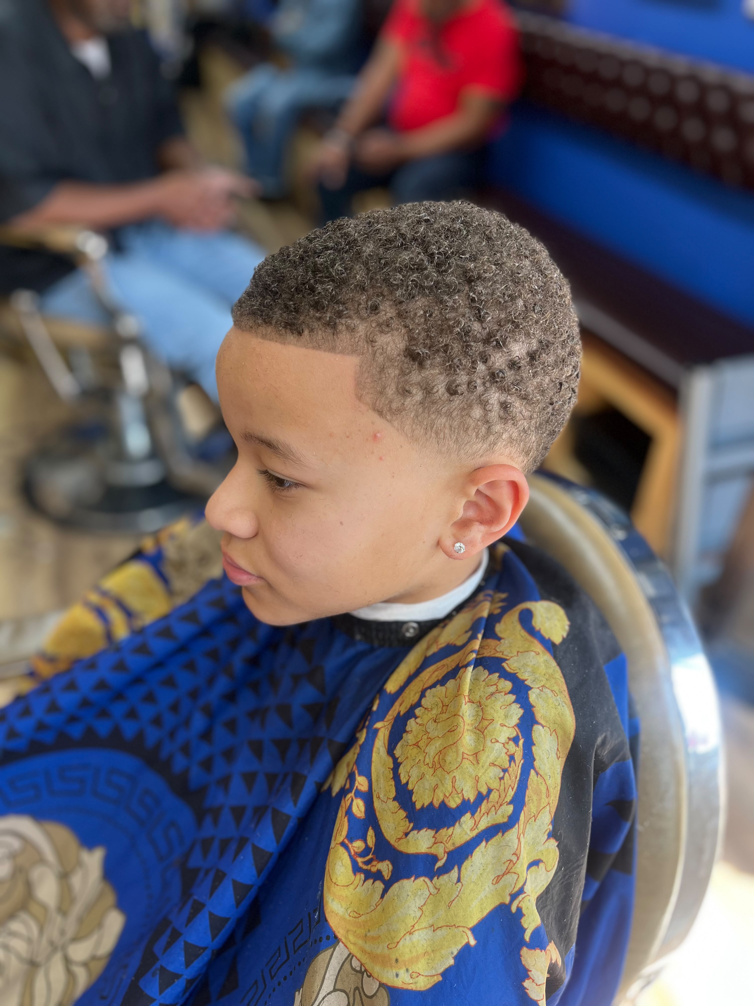 Barber cutting hair