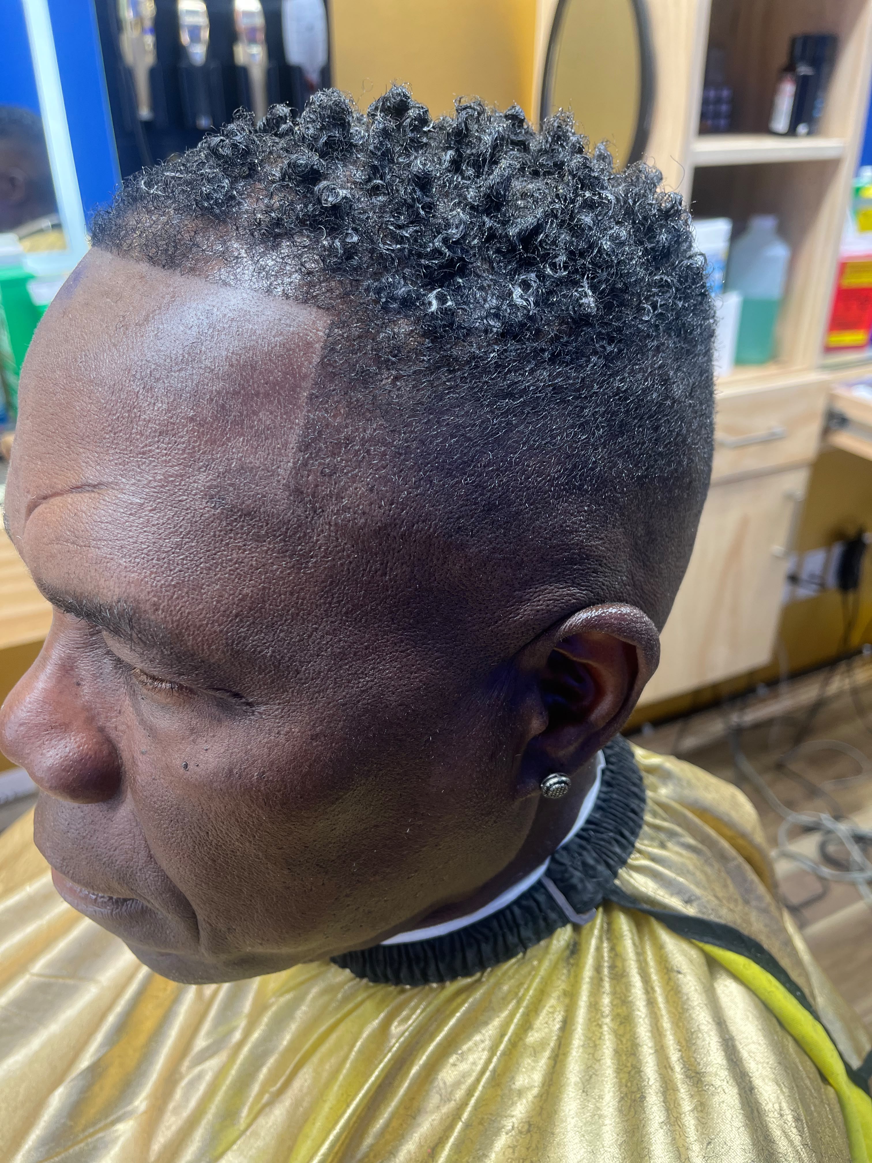 Barber cutting hair