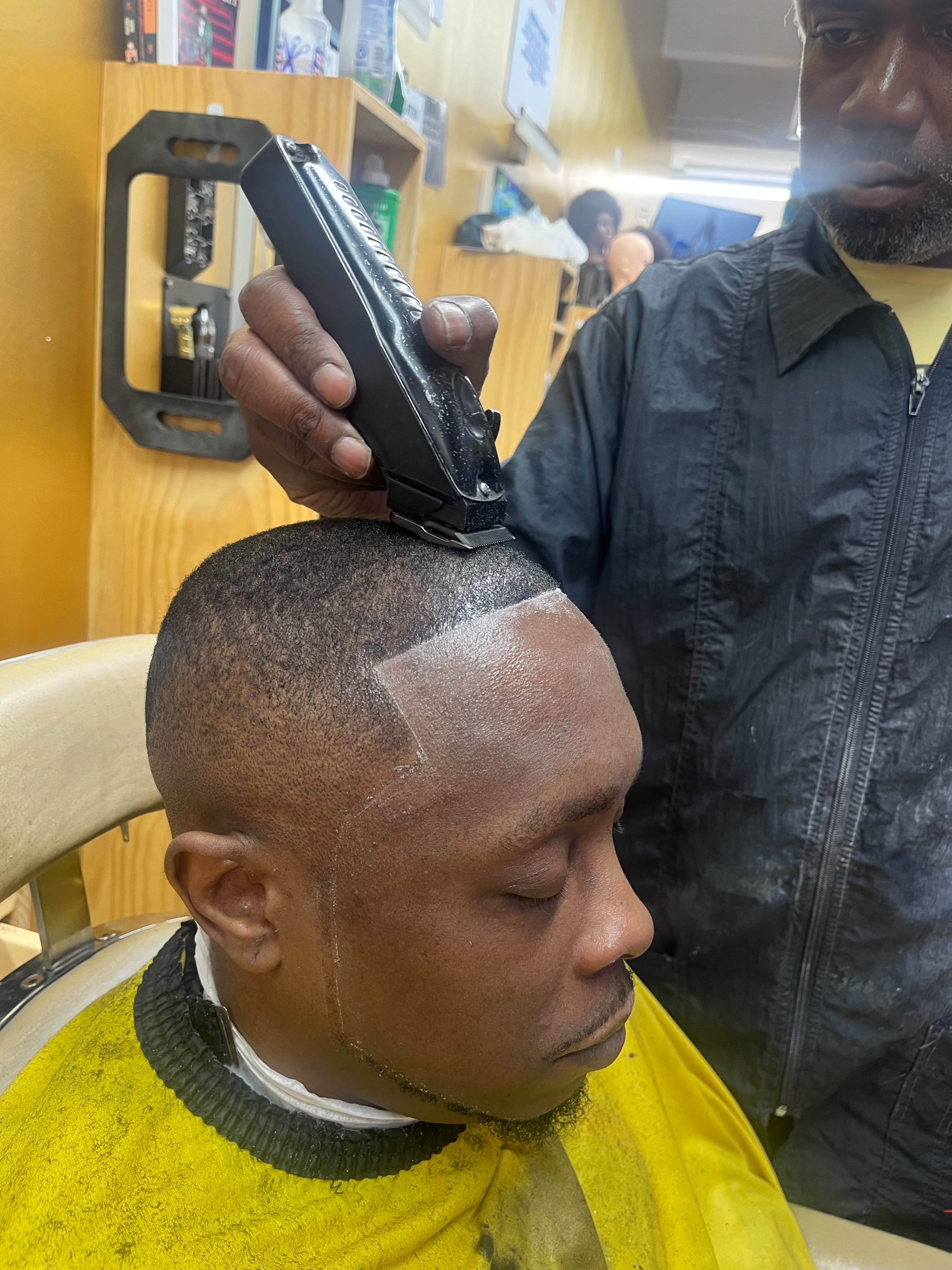 Barber cutting hair