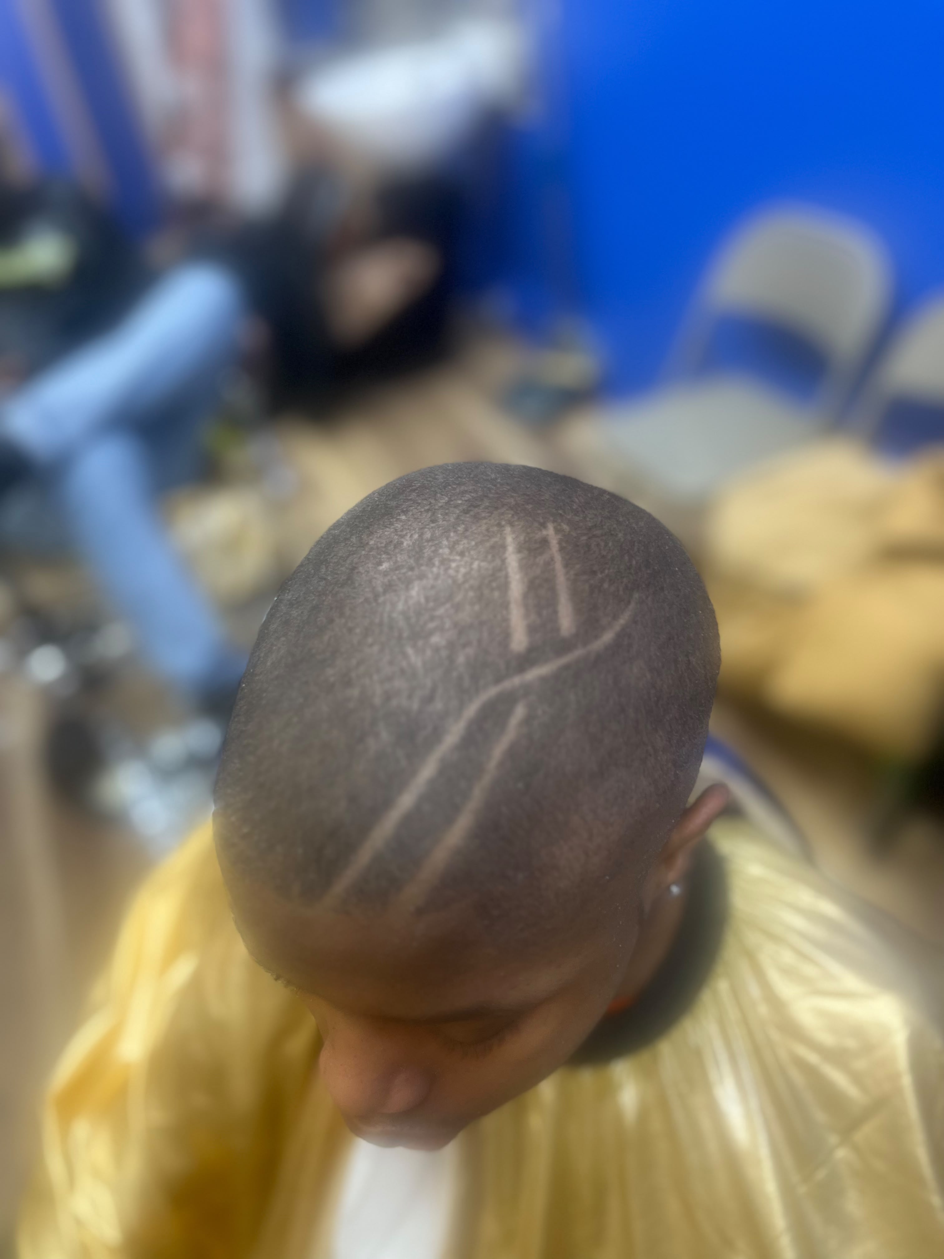 Barber cutting hair