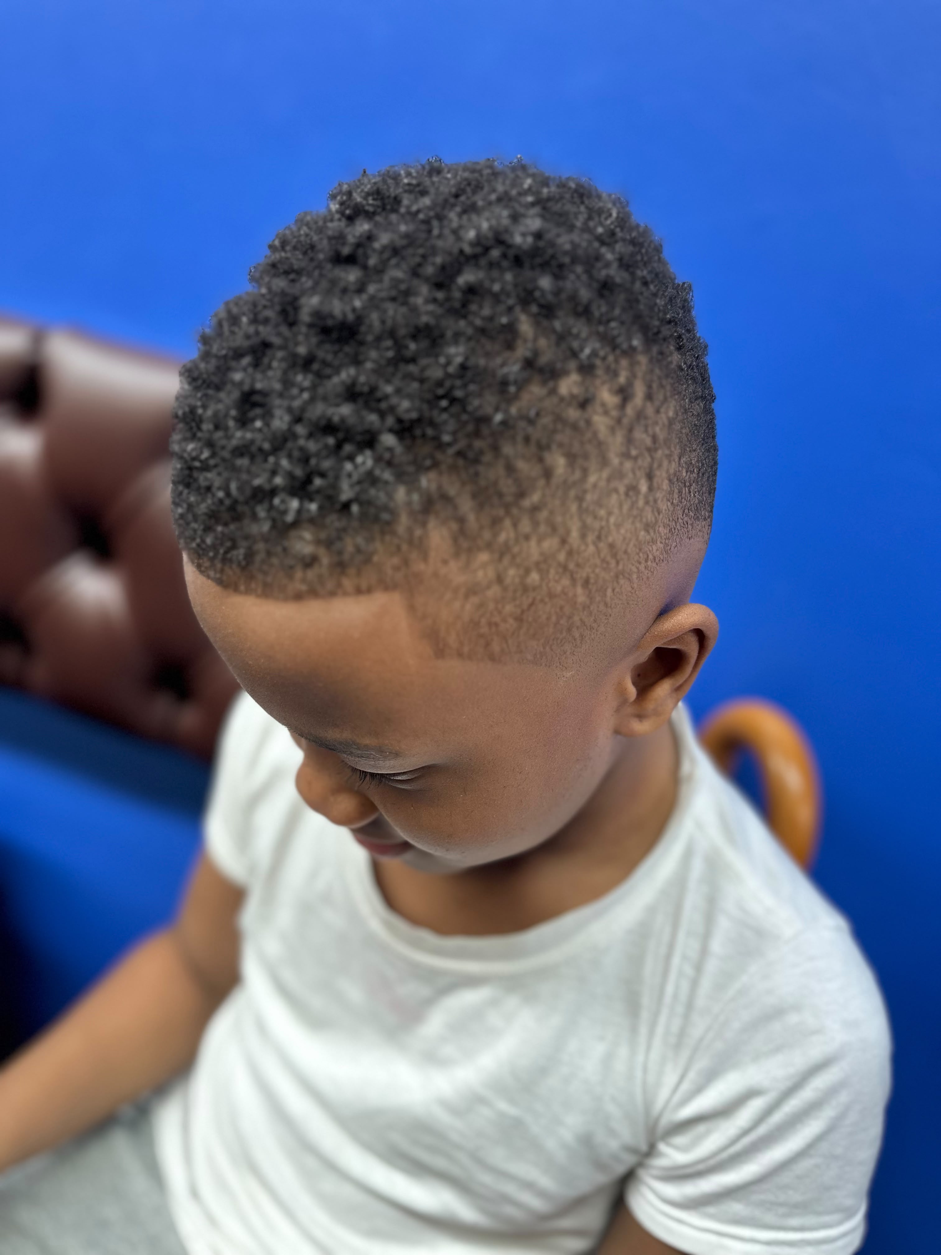 Barber cutting hair