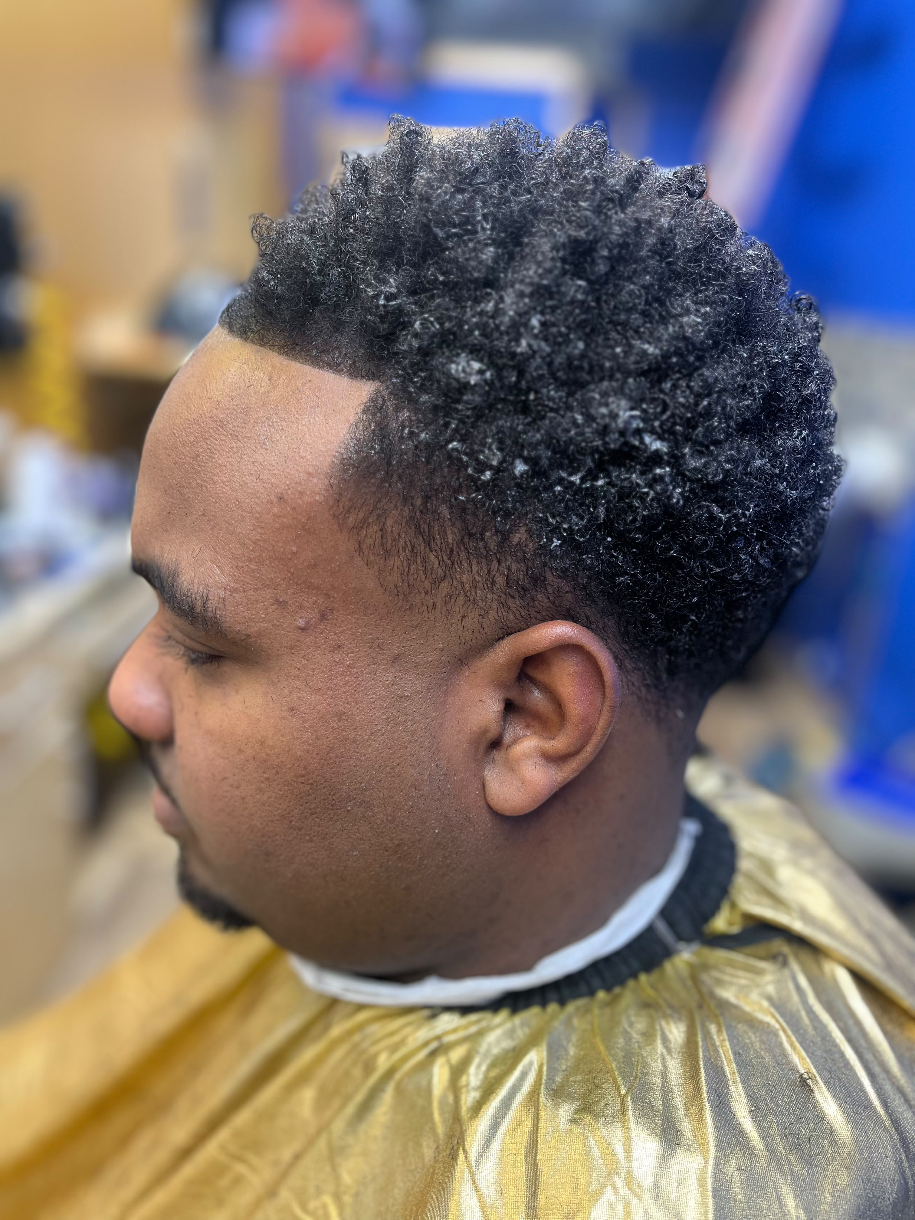 Barber cutting hair
